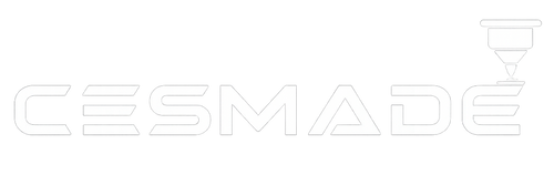 White minimalist wall art featuring the word 'CESMADE' in a thin sans-serif font, with a small white geometric emblem to the right, set against a solid white background.
